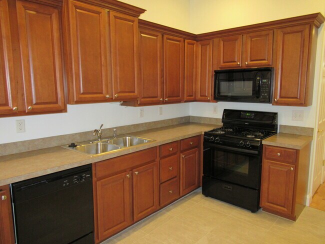 Building Photo - Charming 4 Bedroom/3.5 Bathroom Townhome with Parking Pad in Station North, MD!