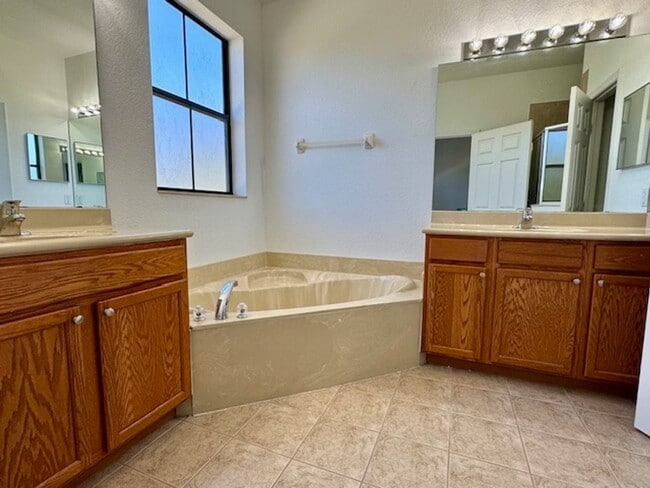 Building Photo - Peaceful 4 Bedroom 3 Full Bath Townhome In...