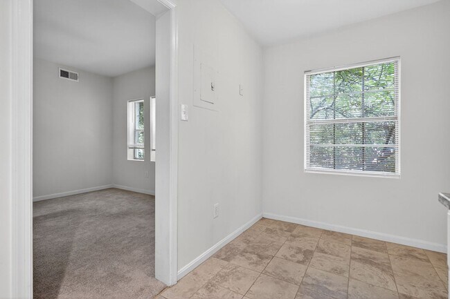 Building Photo - Simply Beautiful, Spacious 2 Bd/1Bth Condo on 50 acres of parklike setting w/ winding paths!