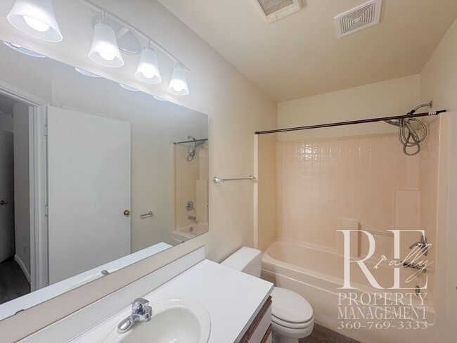 Building Photo - Duplex Living with Expansive Yard, LVP Flooring & Spacious Layout