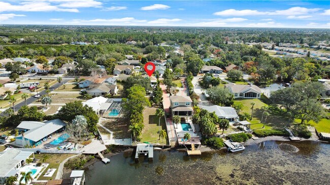 Building Photo - 4 Bed Waterfront Paradise with Pool, Dock & Gulf Access in Baileys Bluff