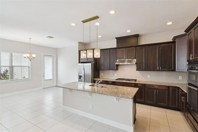 Building Photo - 8884 Bismarck Palm Dr