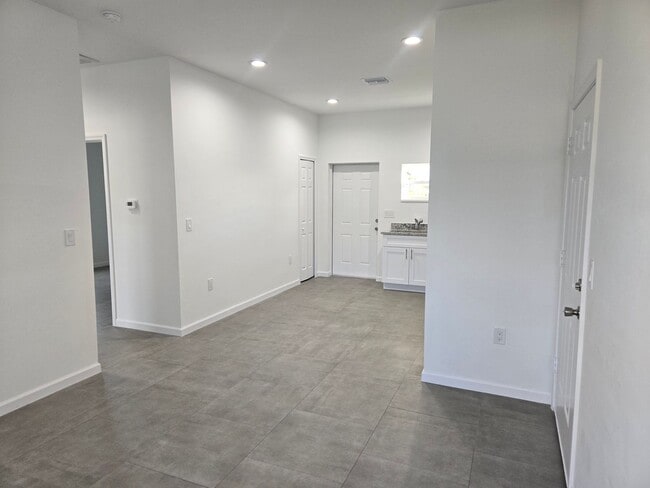 Building Photo - Brand-New 2/2/1 -SW Lehigh Acres-See this ...