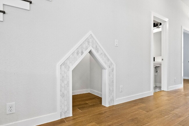 Building Photo - Greenbelt. 3 Car Garage. Built In Dog Room.