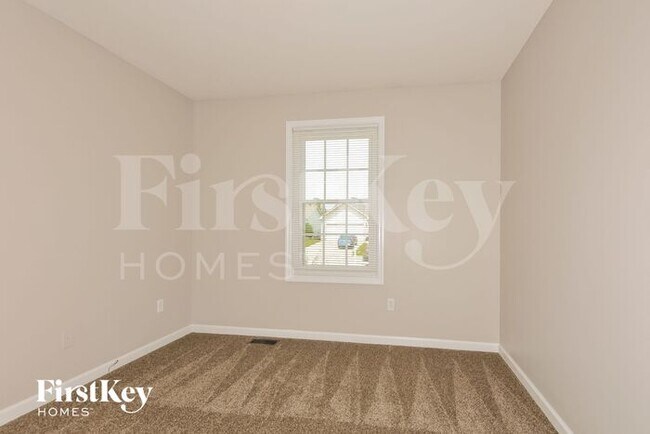 Building Photo - 1405 Sportsmans Ct