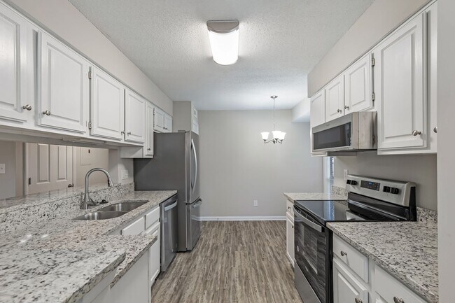 Building Photo - Discover Your Lakeside Oasis: 2 Bedroom Condo at Harris Lake