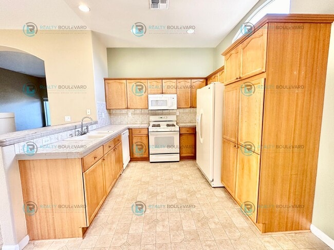 Building Photo - Open Layout, Big Yard, Great Location—This One Has It All!