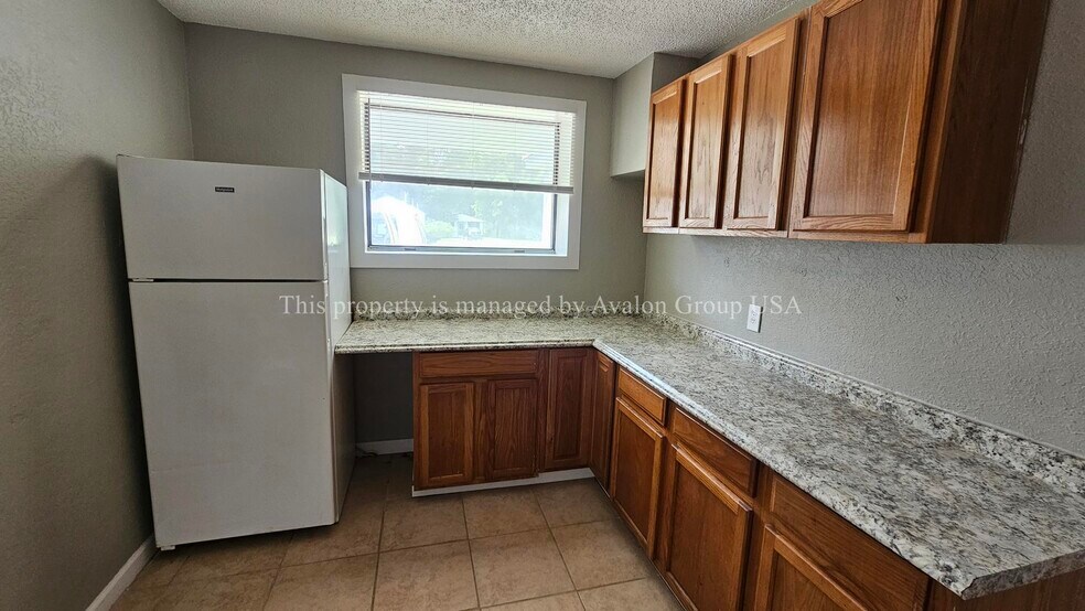 Building Photo - 7007 Oakwood Dr