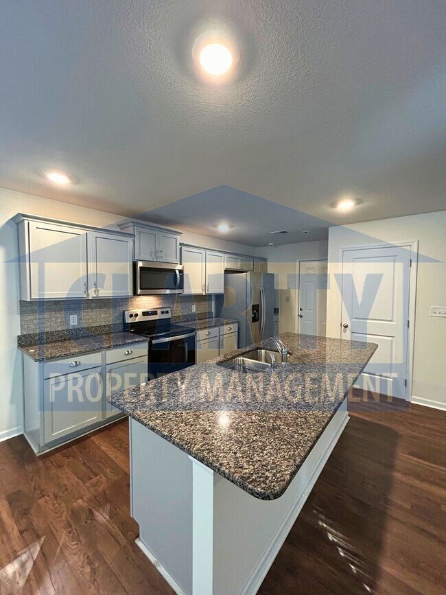 Building Photo - Four-bedroom home in a spacious cul-de-sac lot!