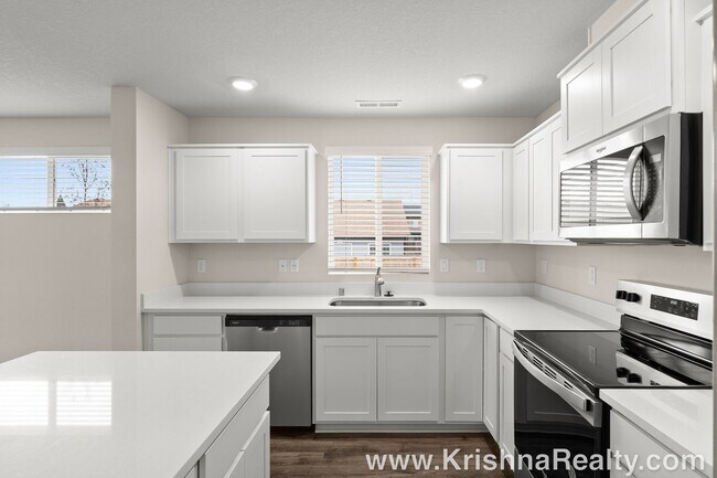 Building Photo - Modern 1-Year-Old NEW CONSTRUCTION 3 BR, 2.5 BA DR Horton Townhome with Community Playground