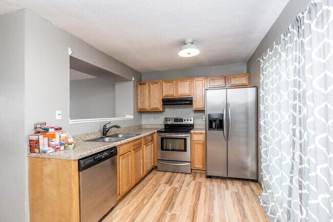 Building Photo - 7695 Barkwood Dr