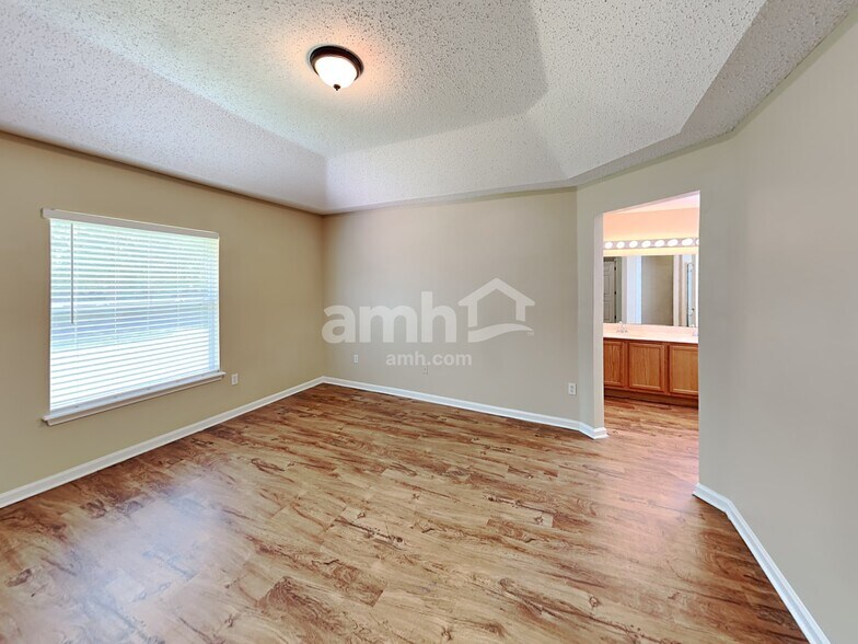Building Photo - 6815 Rapid River Dr