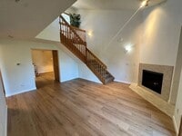 Building Photo - Stylish 3rd Level, Private 2 bedroom Apartment With LVP Flooring, Decks, Gas Fireplace & In-Unit ...
