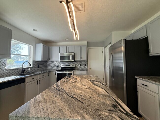 Building Photo - 1925 SW Libra Ln