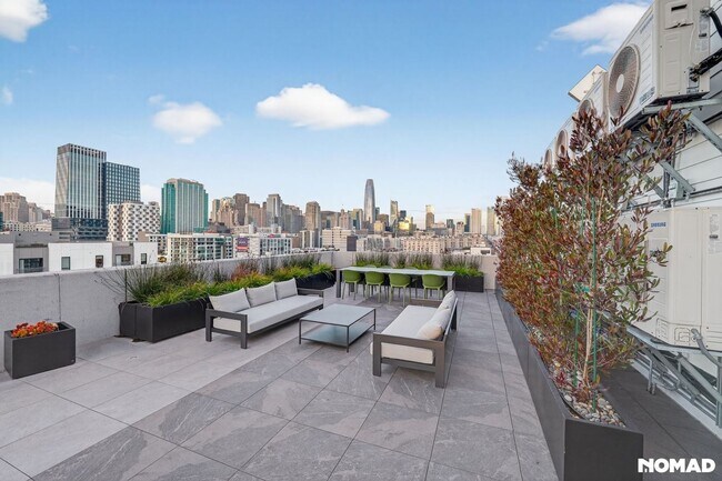 Building Photo - Act Fast: Luxury SoMa Corner Unit w/ EV Parking & Views