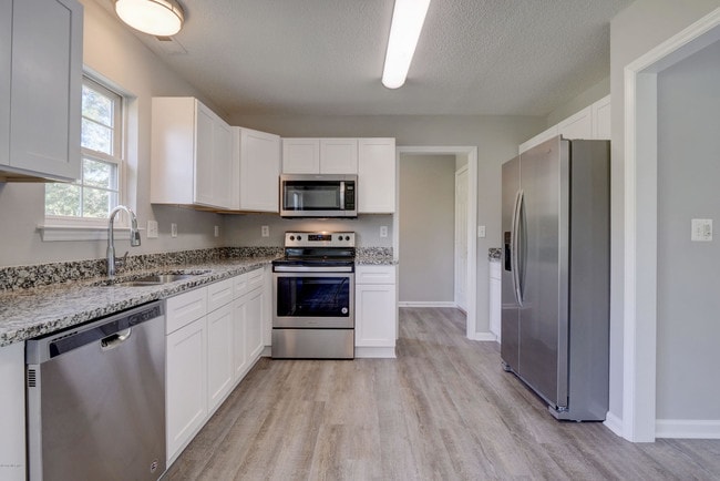 Building Photo - 1003 Windgate Dr