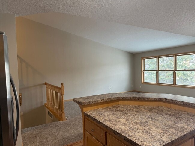 Building Photo - Spacious 3BR / 3BA Townhome with 2-Car Garage – Available Mid-March!