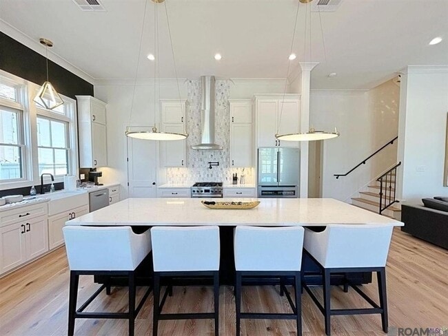 Building Photo - 3118 Pointe-Marie Dr