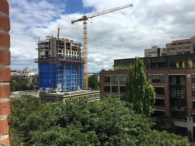 Building Photo - Historic Chown Pella Lofts - east facing studio w/parking/most utilities/rooftop deck