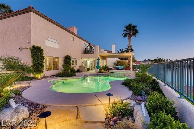 Building Photo - Vegas's Only Available Waterfront Rental ~ 4 Bedroom Desert Shores Lake Front Home