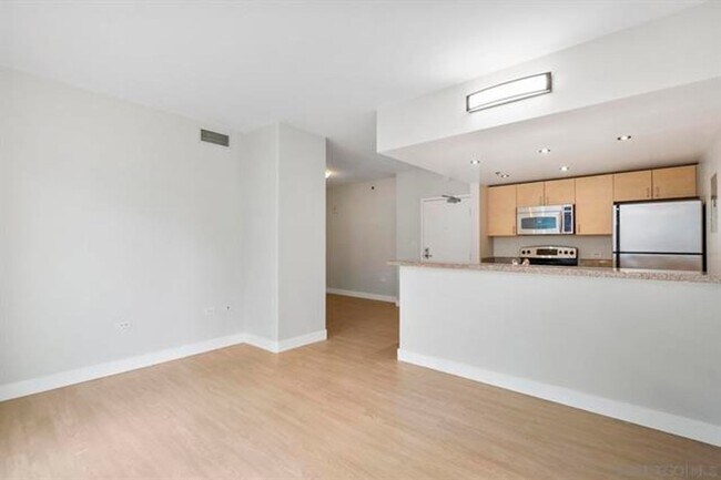 Building Photo - Urban Living in the Heart of Little Italy – 2 Bed / 1 Bath Condo at Acqua Vista