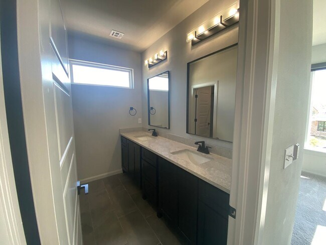 Building Photo - Beautiful contemporary 2-story home with 3 bedrooms and 2 bathrooms in Addison Creek.