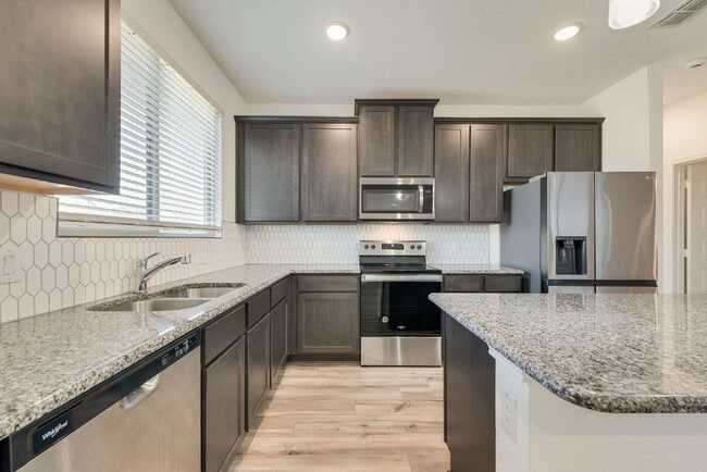 Building Photo - Fantastic newer 3-2-2 in Heartland Master Planned Community