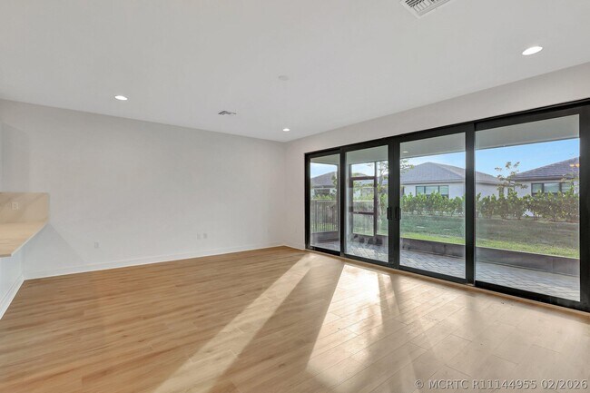 Building Photo - 12416 SW Blue Mangrove Pkwy
