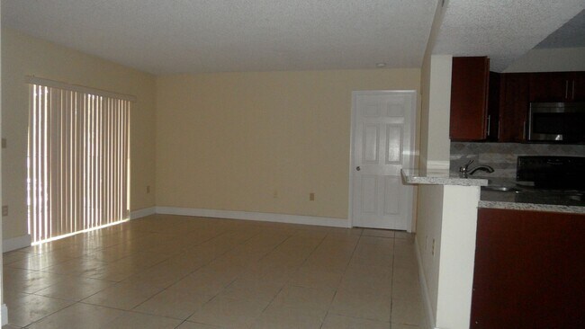 Building Photo - 2Bed/2Ath Condo w/ Balcony @ The Palms of Pembroke Pines