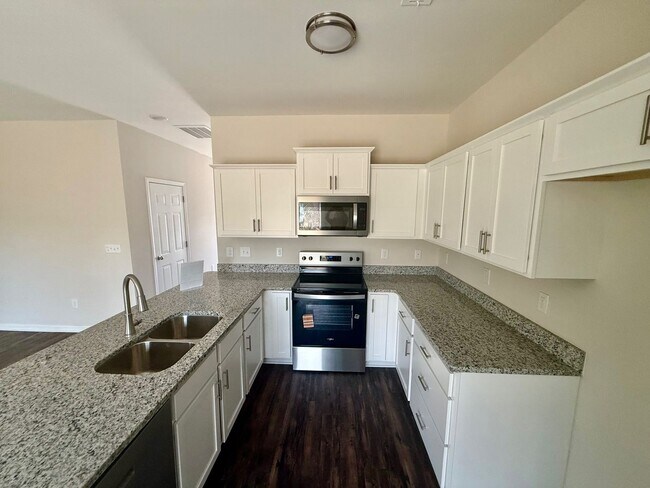 Building Photo - Two bedroom, 2.5 bath townhome in Ridge Creek, Whitsett-Save $1050!