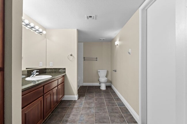 Building Photo - SE!!! Gated!! 1 Bedroom 1st Floor!! One Car Garage!!! Community Pool, Spa, Clubhouse!!! All tile ...