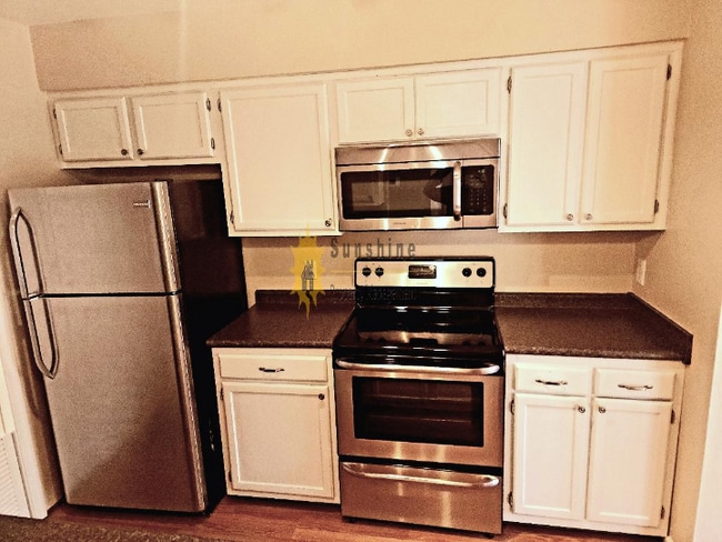 Building Photo - WOW!! Single level townhouse