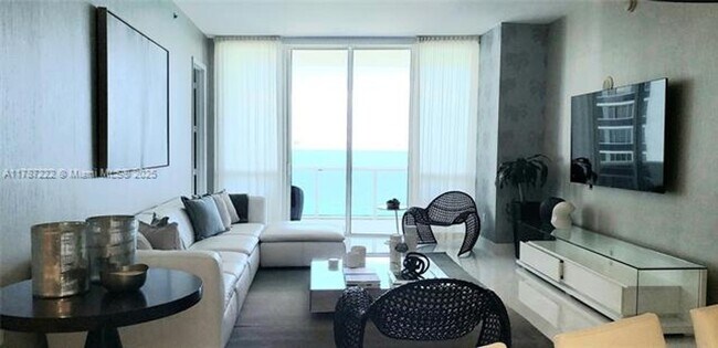 Building Photo - 15811 Collins Ave