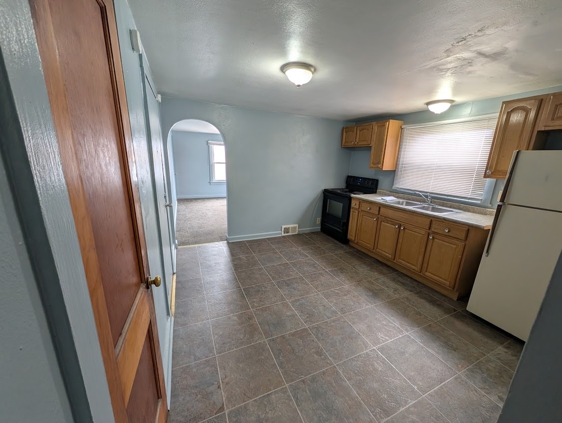 Kitchen looking towards Living Room - 222 Dr Martin Luther King Jr Blvd