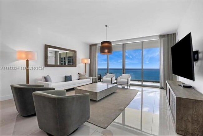 Building Photo - 18975 Collins Ave