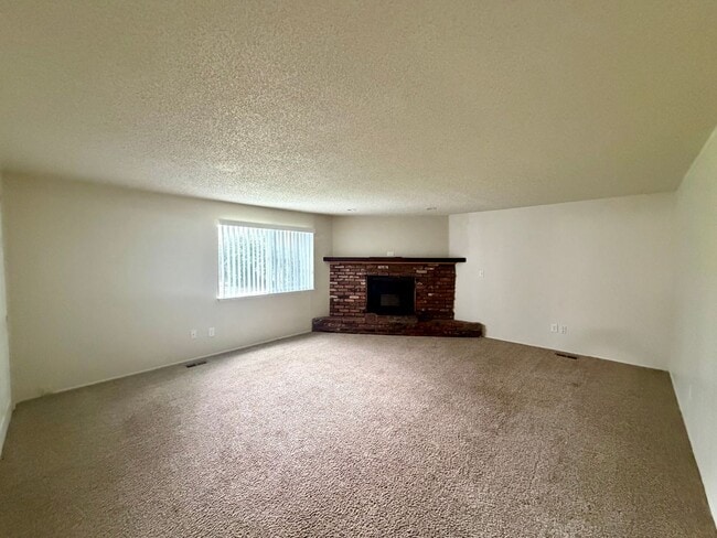 Building Photo - One Level Living w/ Private Oversized Backyard + RV Parking