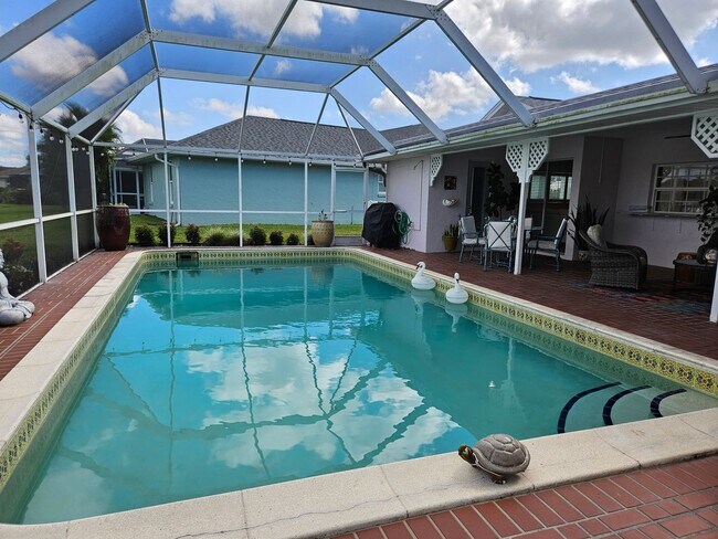 Building Photo - Annual Rental or 6+ month option - FURNISHED HEATED POOL HOME. Gorgeous 3 Bedroom, 3 Bath, 2 Car ...