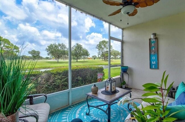 Building Photo - Annual OR Seasonal turnkey FURNISHED 2/2 ground floor condo with golf course and water views