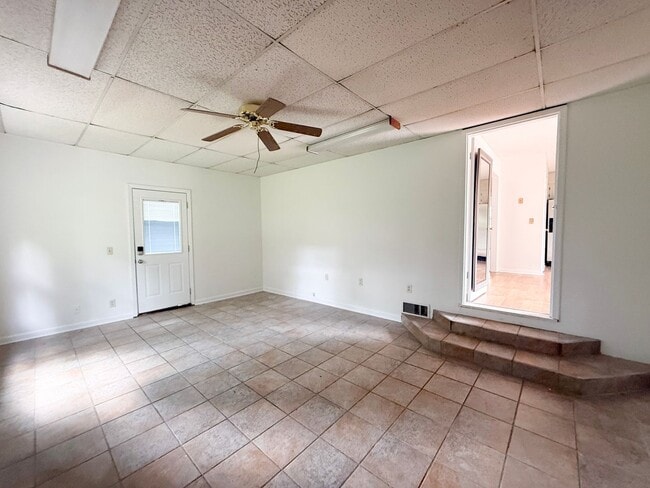 Building Photo - 2-Bedroom Home with Bonus Room & Large Wooden Deck | Pet-Friendly Near I-40 & City Lake