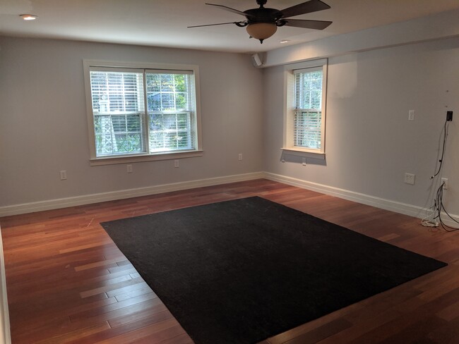 Bedroom with ceiling fan - 8290 Armetale Ln