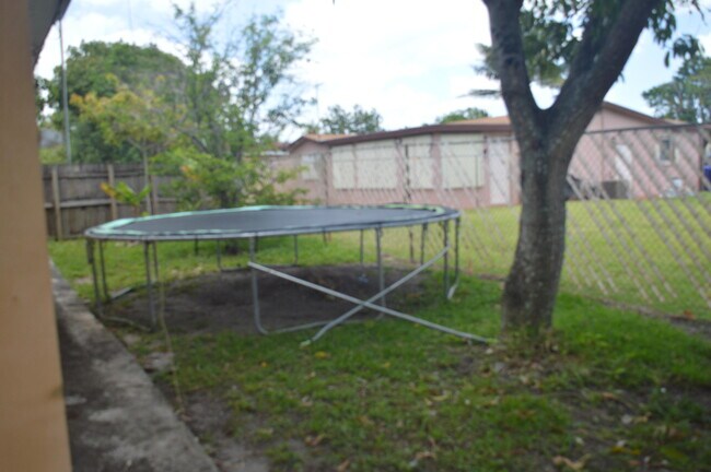 Building Photo - 896 SW 64th Terrace