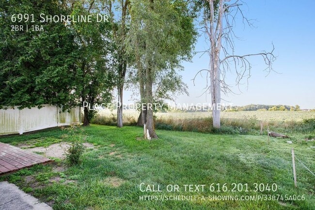 Building Photo - 6991 Shoreline Dr