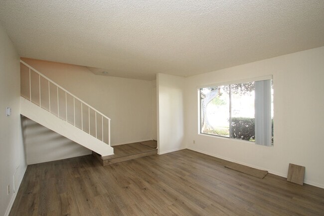 Building Photo - Coming Soon – Charming 3-Bedroom Townhome ...