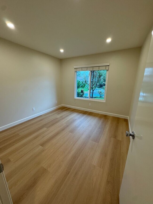 Building Photo - Renovated Home with Modern Comfort and Spa...