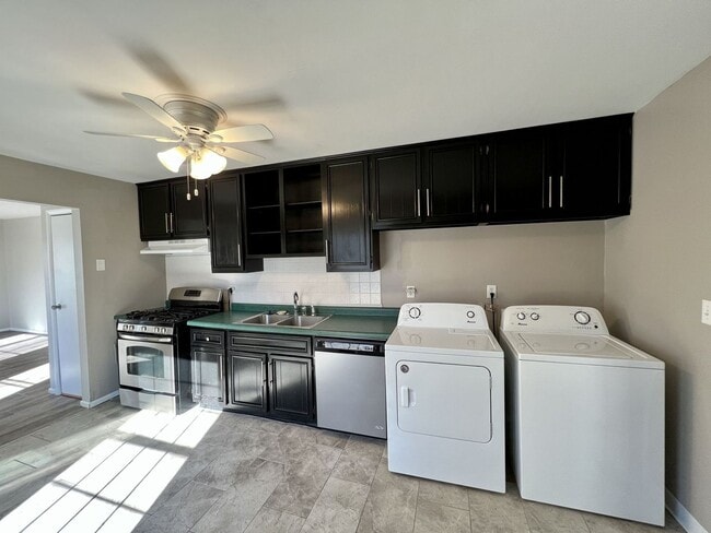 Building Photo - Charming Ranch Home with Flexible Space and Private Backyard