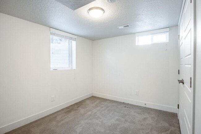 Building Photo - Updated and Bright Home with Yard