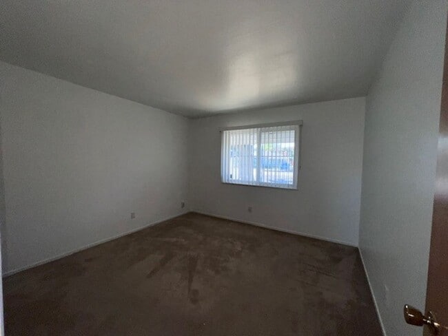 Building Photo - Freshly painted home with large backyard. ...