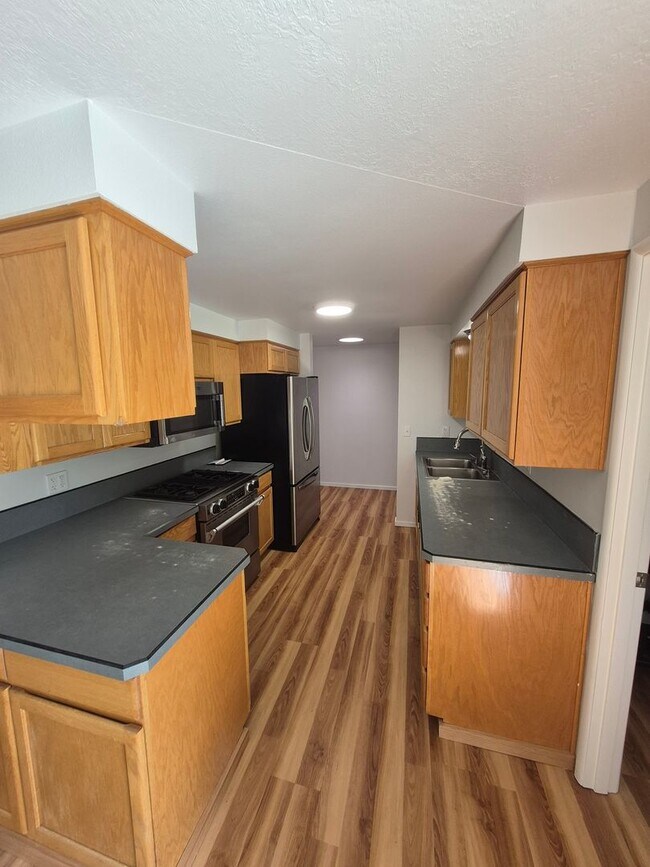 Building Photo - Refurbished home with Basement and large yard
