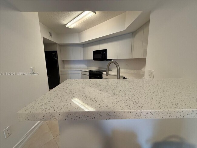 Building Photo - 16699 Collins Ave