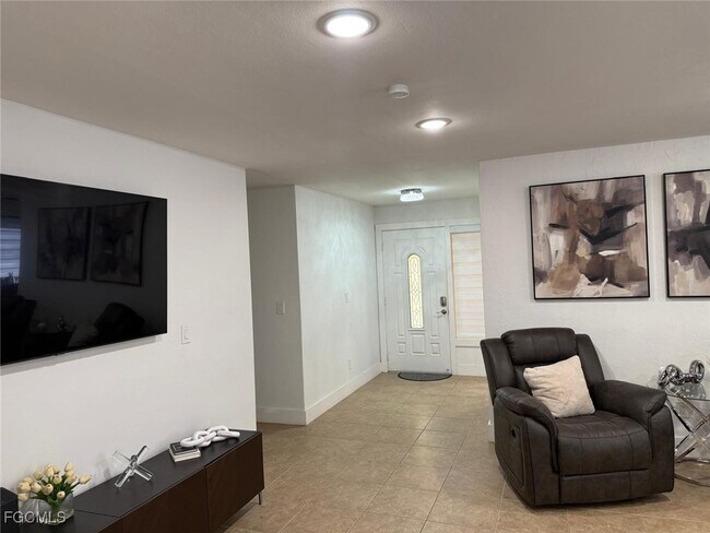 Building Photo - 1335 NE Pine Island Ln